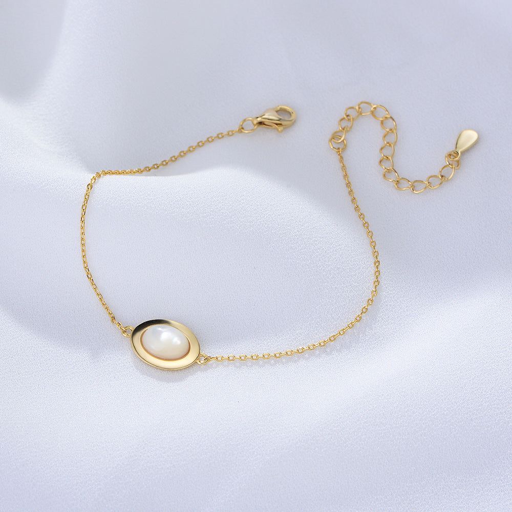 Pearl Elegance Duo: Oval Elegance Necklace & Serene Elegance Bracelet